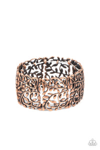 Brushed in an antiqued shimmer, leafy copper filigree frames are threaded along stretchy bands around the wrist for a vintage inspired look.