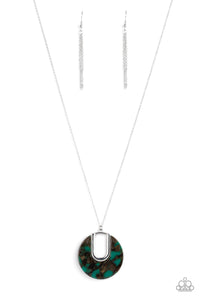 Flecked in shimmer, a faux marble green acrylic piece is pressed into a shimmery silver frame, creating a retro pendant at the bottom of a lengthened silver chain. Features an adjustable clasp closure.