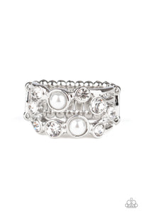 Featuring shiny silver fittings, pearly white beads and glassy white rhinestones coalesce into bubbly layers across the finger. Features a dainty stretchy band for a flexible fit.