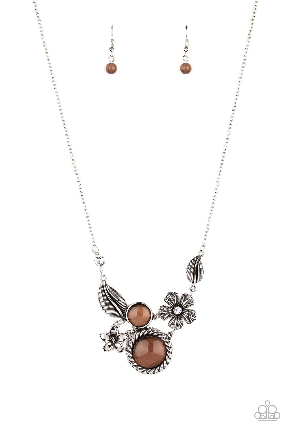 Dotted with brown cat's eye stones and dainty white rhinestones, mismatched floral frames connect below the collar for a whimsical look. Features an adjustable clasp closure.