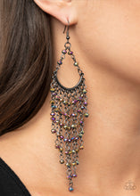 Load image into Gallery viewer, Oil spill rhinestone beaded tassels cascade from the bottom of a bowing gunmetal bar, creating an ethereal tapered fringe. Earring attaches to a standard fishhook fitting.  Sold as one pair of earrings.  New Kit FANFAVORITE This Fan Favorite is back in the spotlight at the request of our 2021 Life of the Party member with Black Diamond Access
