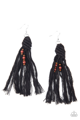 Dainty wooden and glassy brown beads are knotted in place along a knotted black tassel, creating a beach inspired macramé centerpiece. Earring attaches to a standard fishhook fitting.