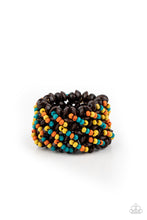 Load image into Gallery viewer, A collection of dainty blue, orange, and yellow wooden beads and brown wooden discs are threaded along knotted stretchy bands, creating a tropical floral pattern around the wrist.  
