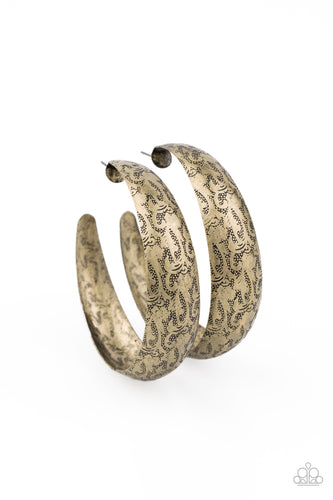 Delicately hammered in studded-like patterns, an oversized antiqued brass hoop boldly curls around the ear for a whimsically rustic look. Earring attaches to a standard post fitting. Hoop measures approximately 2