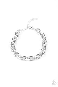 An array of chunky silver links connect across the wrist for a bold chain look. Features an adjustable clasp closure.