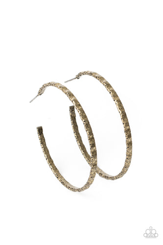 Brushed in an antiqued finish, a gritty brass hoop is hammered in grungy details for an edgy industrial flair. Earring attaches to a standard post fitting. Hoop measures approximately 2