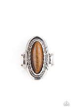 Load image into Gallery viewer, An oblong tiger&#39;s eye stone is pressed into the center of an oval silver frame stamped and embossed in mismatched patterns for a seasonal flair. Features a stretchy band for a flexible fit.
