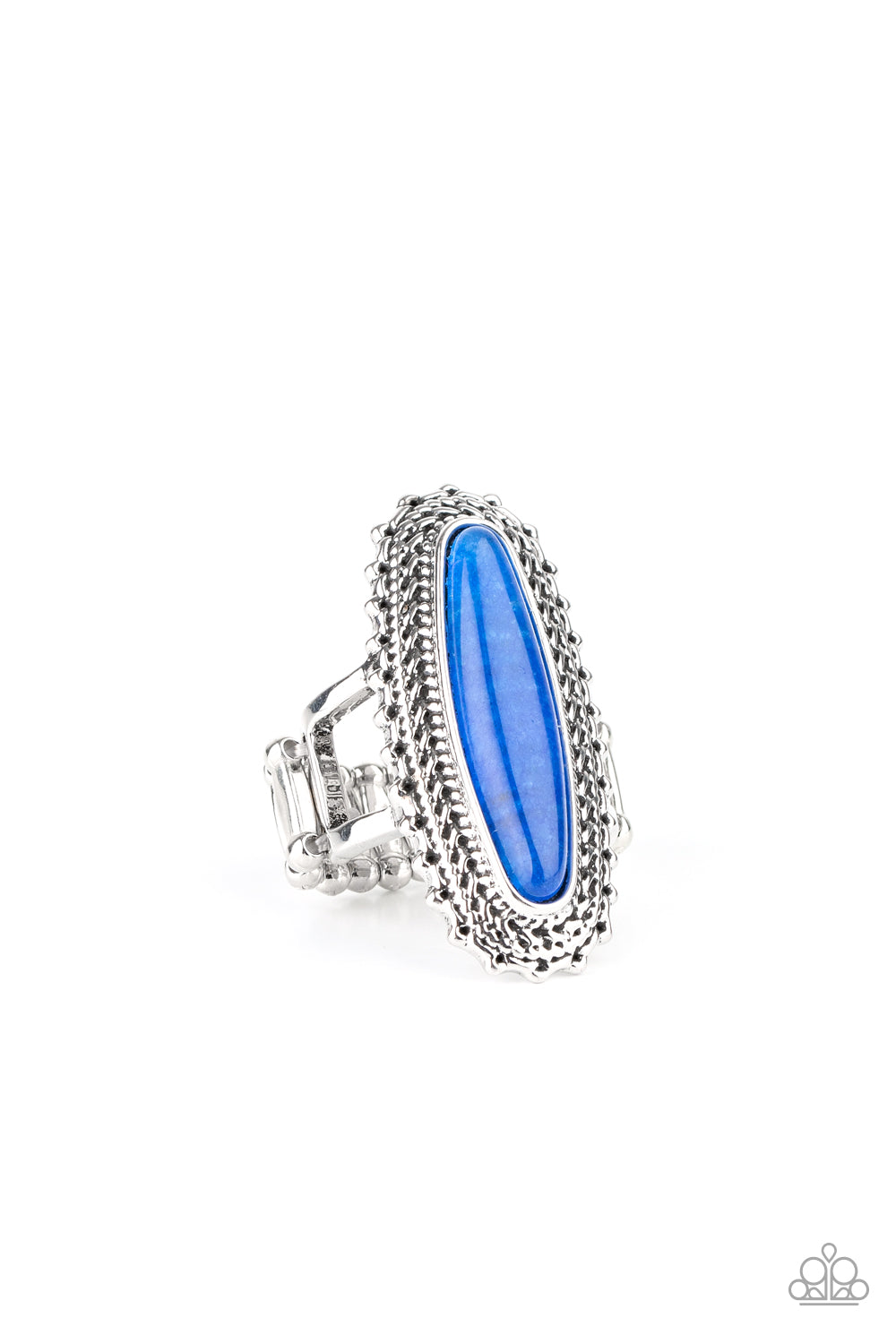 An oblong blue stone adorns the center of an elongated silver frame featuring mismatched silver textures for a bold artisan look. Features a stretchy band for a flexible fit.