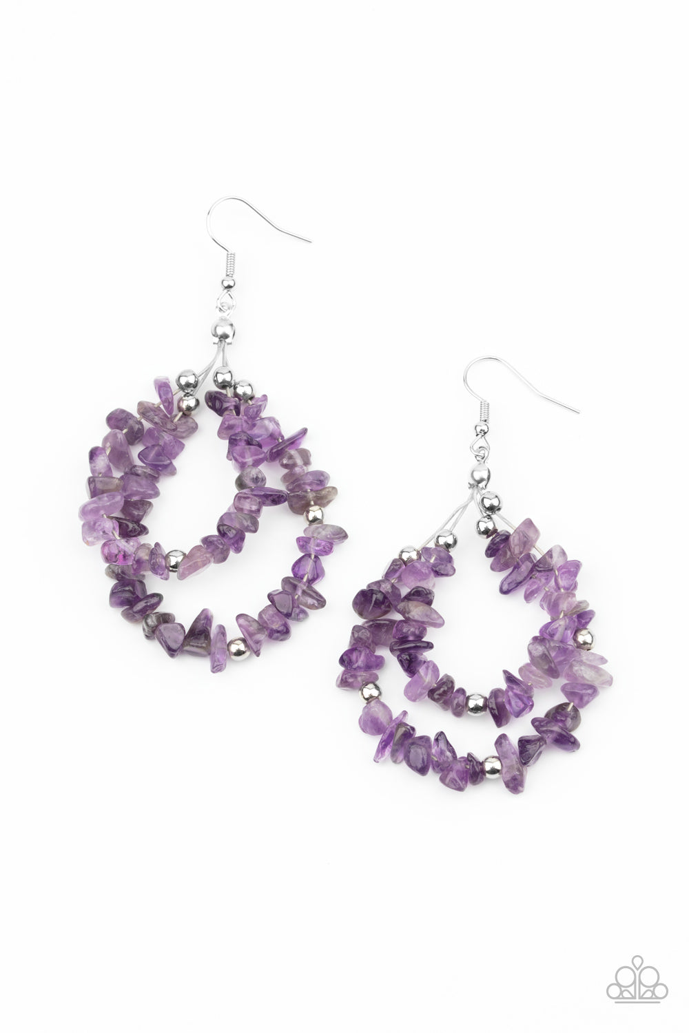 An earthy collection of raw purple stones and dainty silver beads are threaded along two dainty silver wires, layering into an earthy teardrop. Earring attaches to a standard fishhook fitting. 