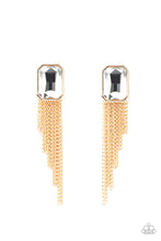 Load image into Gallery viewer, Tapered gold chains stream from the bottom of an oversized white emerald cut gem, creating a regal fringe. Earring attaches to a standard post fitting.
