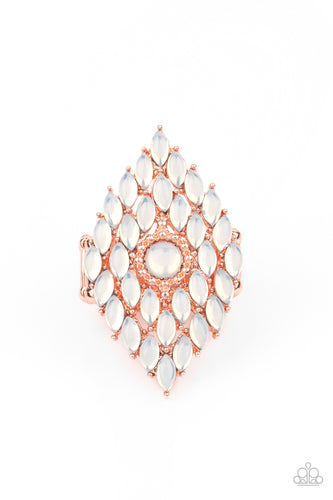 Featuring regal marquise style cuts, rows of iridescent cat's eye stone beads stack around a round cat's eye stone beaded center, creating an ethereal centerpiece atop the finger. Features a stretchy band for a flexible fit.