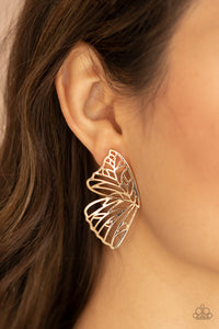 Shimmery gold bars delicately climb scalloped gold frames, coalescing into a whimsical butterfly wing. Earring attaches to a standard post fitting