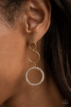 Load image into Gallery viewer, Two dainty gold rings give way to a white rhinestone encrusted gold hoop, adding a timeless twist to the dazzling display. Earring attaches to a standard post fitting
