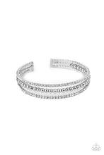 Load image into Gallery viewer, Two strands of dazzling white rhinestones flank a row of shiny silver beads, coalescing into a sparkly layered cuff around the wrist.
