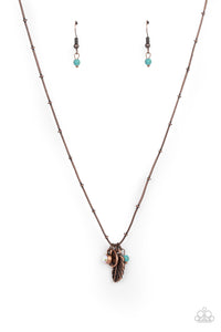 A whimsical collection of charms glide along a beaded copper chain below the collar in a free-spirited fashion. The antiqued charms include a hammered disc, turquoise stone bead, iridescent rhinestone, and lifelike copper feather. Features an adjustable clasp closure.