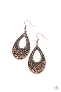Featuring an airy studded center, the thickened bottom of an antiqued copper teardrop is embossed in a flowery pattern for a whimsical flair. Earring attaches to a standard fishhook fitting.