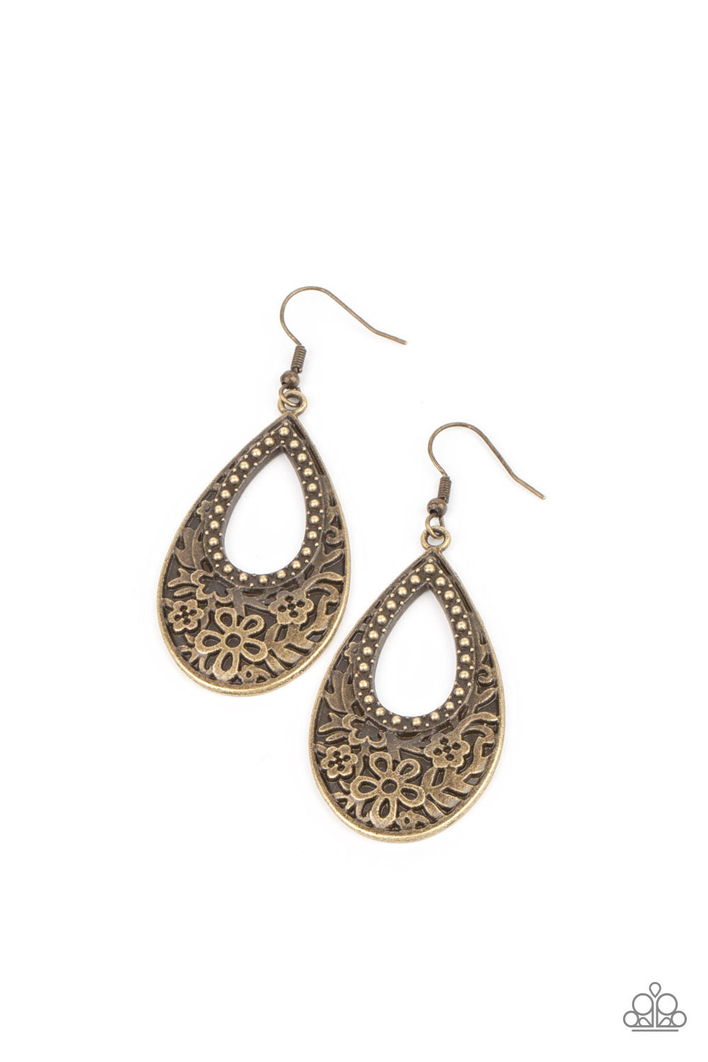 Featuring an airy studded center, the thickened bottom of an antiqued brass teardrop is embossed in a flowery pattern for a whimsical flair. Earring attaches to a standard fishhook fitting.