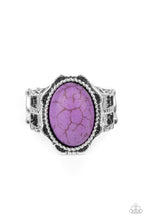 Load image into Gallery viewer, An oval purple stone is pressed into the center of a silver studded floral frame, creating a colorful centerpiece atop the finger. Features a stretchy band for a flexible fit.
