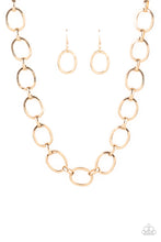 Load image into Gallery viewer, A glistening series of dramatically oversized ovals and links boldly connect below the collar, creating an intense industrial statement. Features an adjustable clasp closure.
