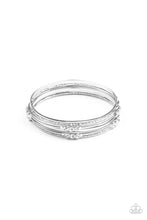 Load image into Gallery viewer, Pairs of plain, textured, and white rhinestone adorned silver bangles glide along the wrist for a sparkly look
