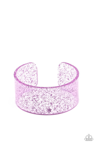 Dainty silvery shavings are encased in a thick purple acrylic cuff, creating an icy incandescence around the wrist.