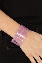 Load image into Gallery viewer, Dainty silvery shavings are encased in a thick purple acrylic cuff, creating an icy incandescence around the wrist.
