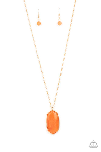 Encased in a classic gold fitting, a glassy orange stone swings from the bottom of a lengthened gold chain for an elegantly earthy look. Features an adjustable clasp closure.
