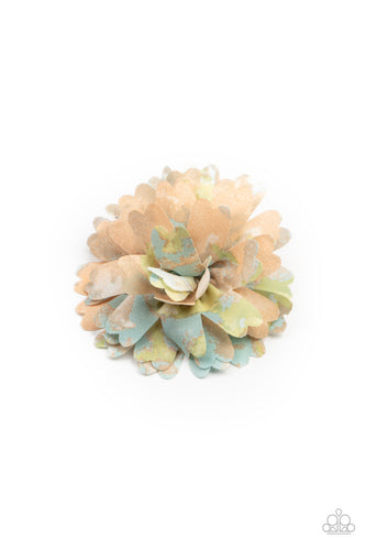 Featuring orange, blue, green, and gray tie dyed accents, scalloped petals gather in a colorful flower. Features a standard hair clip on the back.