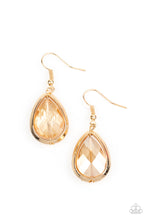 Load image into Gallery viewer, A golden rhinestone gem is threaded along a rod inside a gold teardrop casing, creating a glamorous lure. Earring attaches to a standard fishhook fitting.
