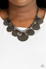 Load image into Gallery viewer, Oversized silver discs and hammered gunmetal discs swing from the bottom of a chunky gunmetal chain, creating a rambunctious fringe below the collar. Features an adjustable clasp closure.
