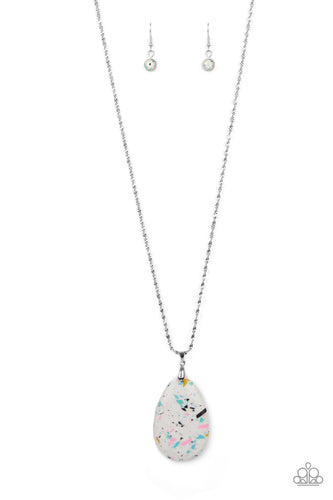 Featuring a terrazzo pattern, a speckled stone teardrop swings from the bottom of an ornately twisted silver chain for an earthy inspiration. Features an adjustable clasp closure.