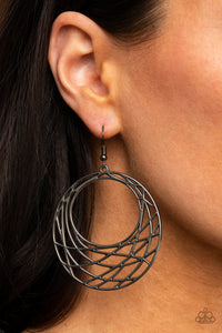 Glistening gunmetal bars crisscross and overlap along the bottom of a circular frame, creating a crescent-like hoop. Earring attaches to a standard fishhook fitting