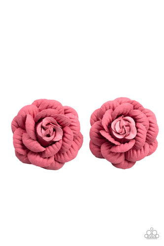 Featuring lifelike textures, papery pink petals delicately gather into a pair of charming rosebuds. Each flower features a standard hair clip on the back.
