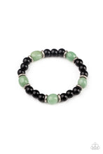 Load image into Gallery viewer, Infused with dainty silver accents, glassy black and green stone beads are threaded along a stretchy band around the wrist for a stackable seasonal look.
