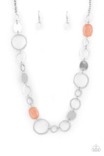 Load image into Gallery viewer, Infused with glassy coral accents, a shiny series of asymmetrical hoops and discs delicately link across the chest for a flirty pop of color. Features an adjustable clasp closure.
