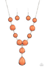 Load image into Gallery viewer, Featuring studded and plain silver frames, small and large orange stones delicately alternate below the collar. A refreshing orange stone teardrop frame swings from the bottom of a matching stone frame, creating an earthy extended pendant. Features an adjustable clasp closure.
