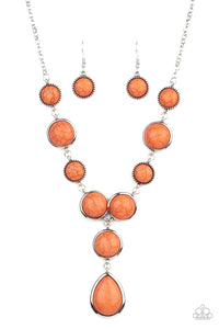 Featuring studded and plain silver frames, small and large orange stones delicately alternate below the collar. A refreshing orange stone teardrop frame swings from the bottom of a matching stone frame, creating an earthy extended pendant. Features an adjustable clasp closure.