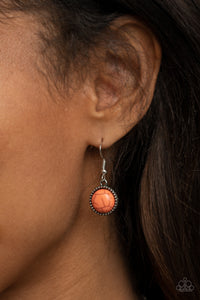 Featuring studded and plain silver frames, small and large orange stones delicately alternate below the collar. A refreshing orange stone teardrop frame swings from the bottom of a matching stone frame, creating an earthy extended pendant. Features an adjustable clasp closure.