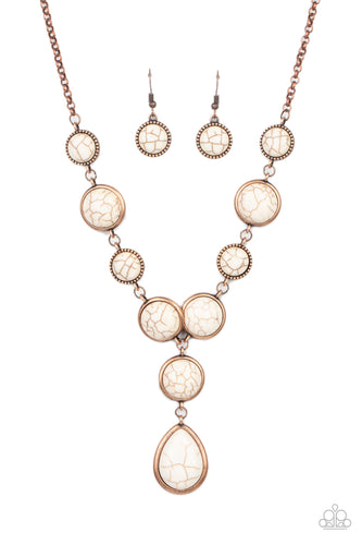 Featuring studded and plain copper frames, small and large white stones delicately alternate below the collar. A refreshing white stone teardrop frame swings from the bottom of a matching stone frame, creating an earthy extended pendant. Features an adjustable clasp closure. 