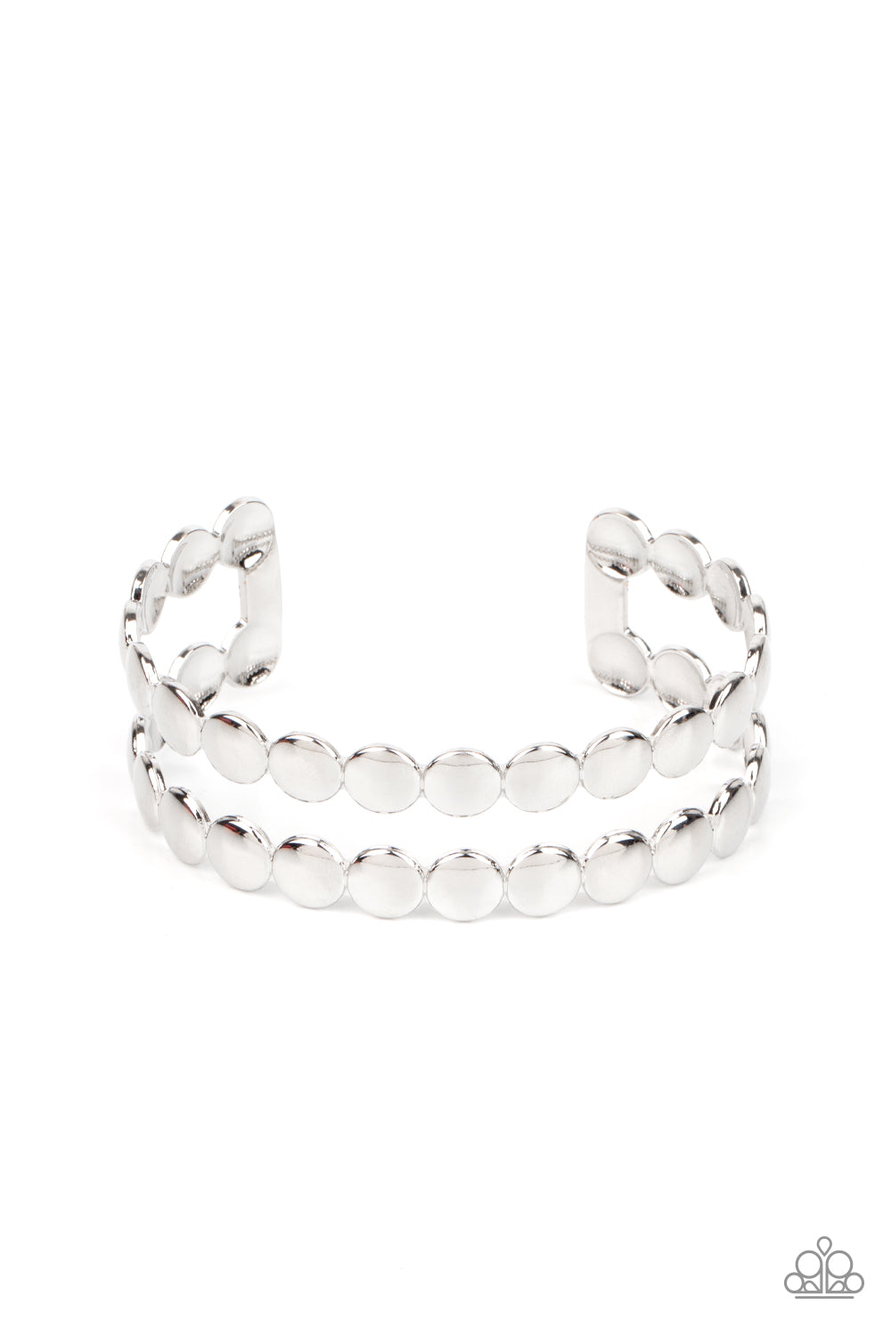 Brushed in a shiny finish, rows of flattened silver studs coalesce into a shimmery cuff around the wrist.