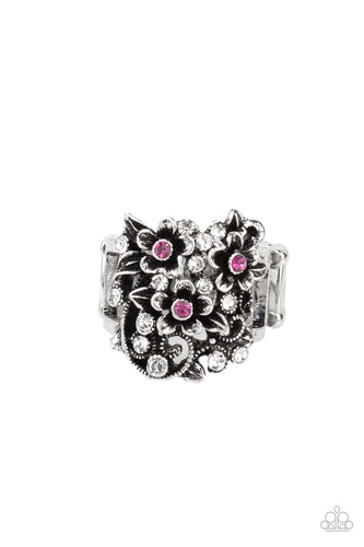 Dotted with dainty pink rhinestone centers, antiqued silver floral frames bloom atop a leafy backdrop of glassy white rhinestones. Features a stretchy band for a flexible fit.