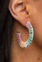 Load image into Gallery viewer, Multicolored wicker-like cording wraps around a thick silver hoop, creating a flirty pop of color. Earring attaches to a standard post fitting. Hoop measures approximately 1 1/2&quot; in diameter.
