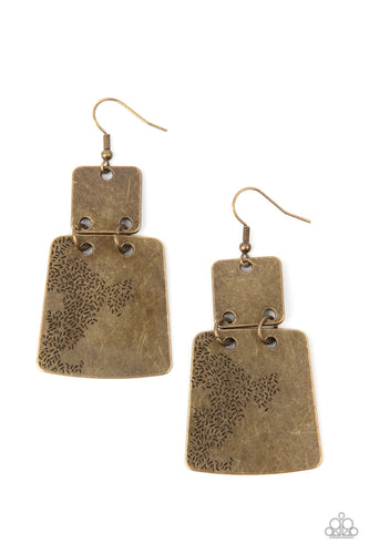 Stamped in an abstract pattern, a flared brass plate links to the bottom of a square brass frame, creating a rustic lure. Earring attaches to a standard fishhook fitting.