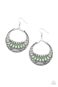 Filled with a silver filigree backdrop, an antiqued crescent frame is adorned with dainty opalescent rhinestones and Green Ash teardrop beads for a mystical finish. Earring attaches to a standard fishhook fitting.