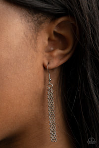 Glistening silver bars connect into edgy 3-dimensional frames below the collar, creating a bold geometric statement piece. Features an adjustable clasp closure. 