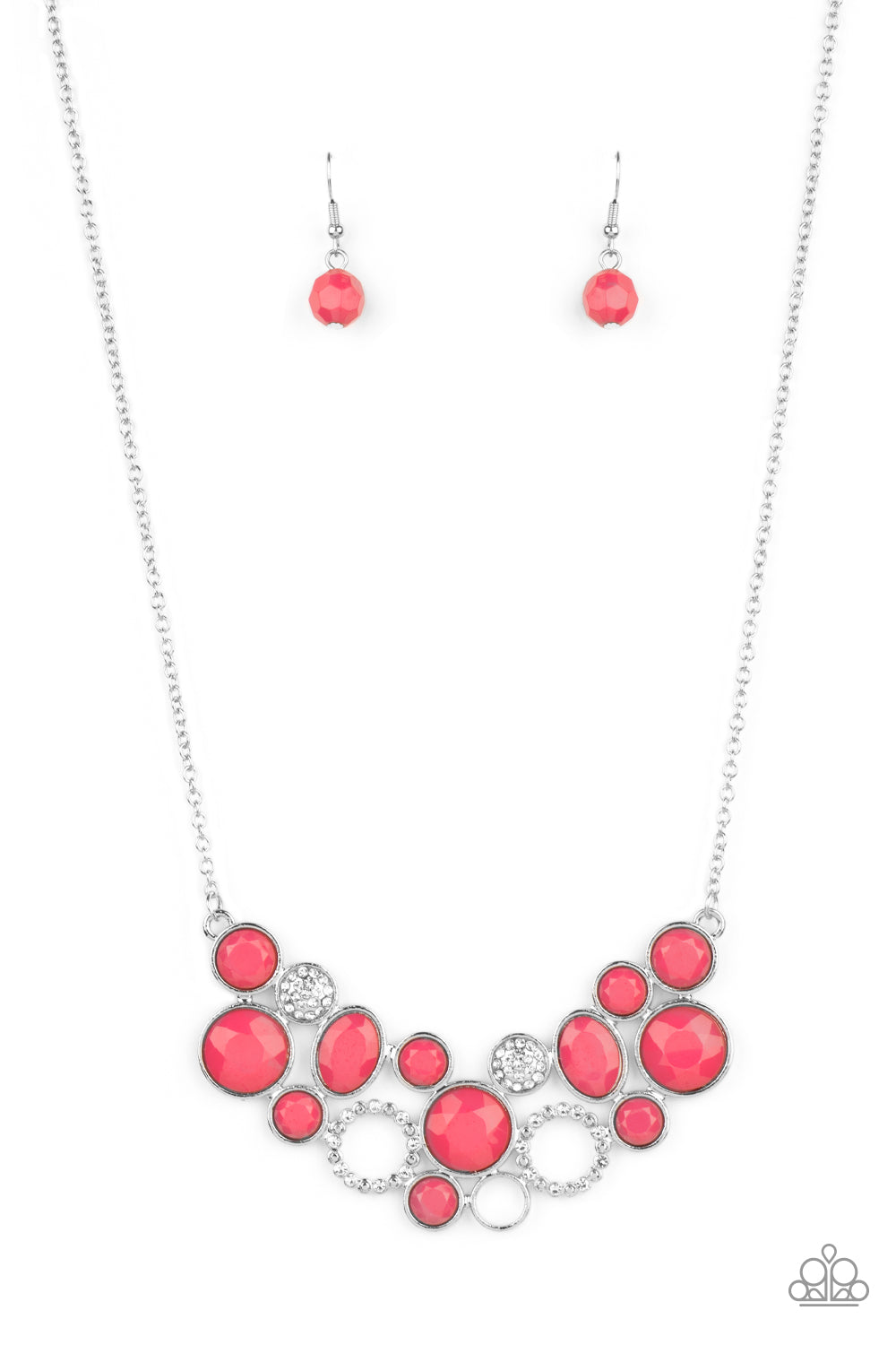 A mismatched collection of faceted pink beaded frames and white rhinestone embellished accents delicately connect into a bubbly clustered pendant below the collar, creating a colorful statement piece. Features an adjustable clasp closure.
