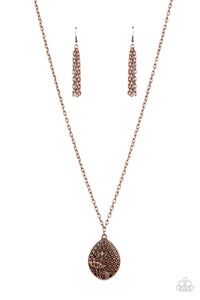 Glistening copper wildflowers climb an ornate copper backdrop that fastens into a locket-inspired frame at the bottom of a lengthened copper chain. Features an adjustable clasp closure.