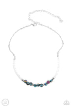 Load image into Gallery viewer, A dainty collection of mismatched oil spill beads ad iridescent crystal-like accents are threaded along an invisible wire around the neck for a stellar look. Features an adjustable clasp closure.
