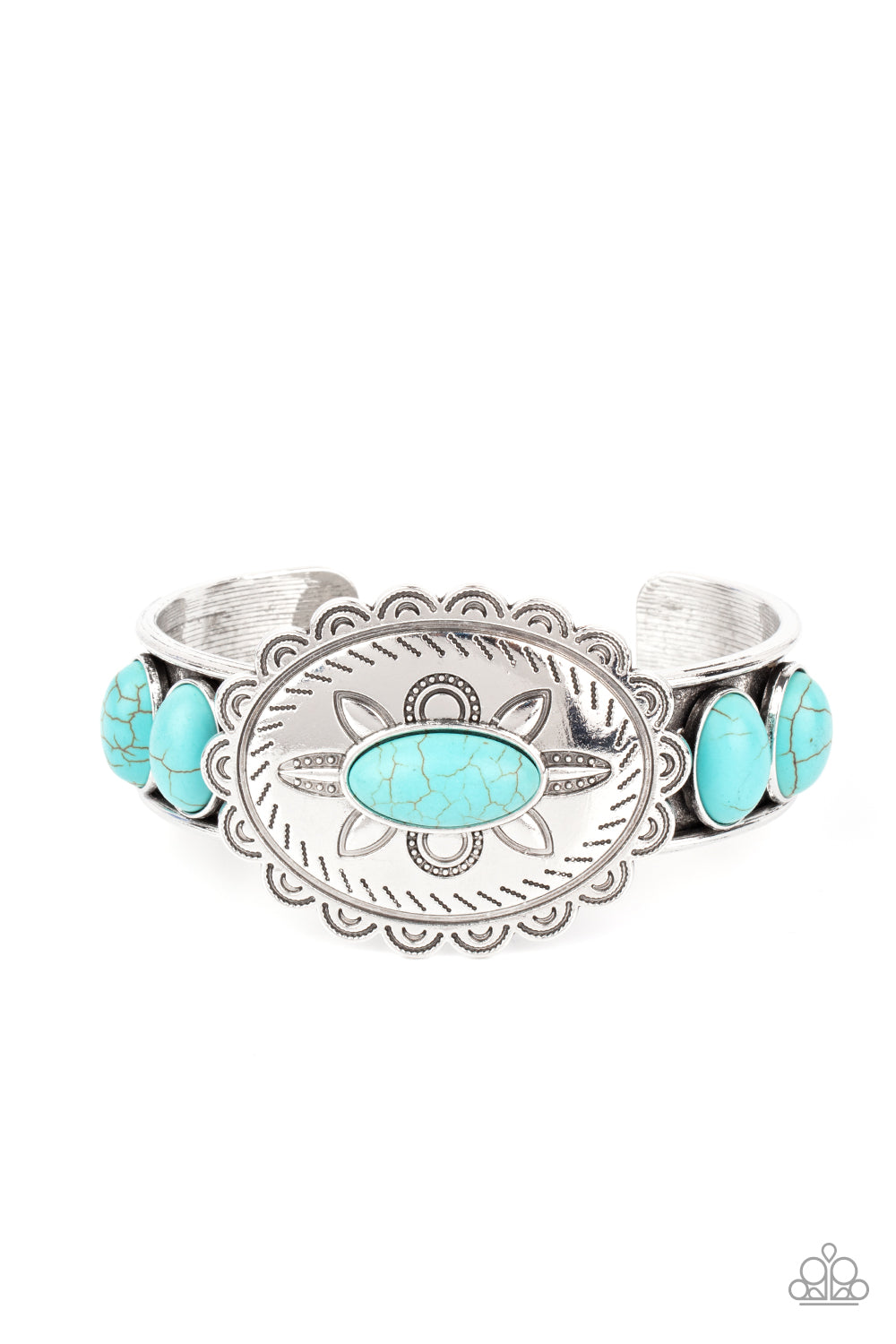 Dotted with a refreshing turquoise stone, a floral stamped scalloped silver frame sits atop a turquoise studded silver cuff, creating a southwestern inspired buckle atop the wrist. 