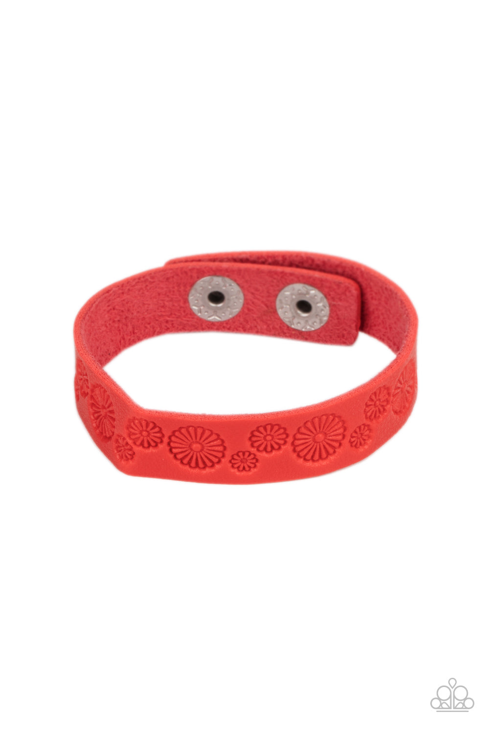 Stamped in a whimsical daisy pattern, a dainty red leather band wraps around the wrist for a seasonal flair. Features an adjustable snap closure.